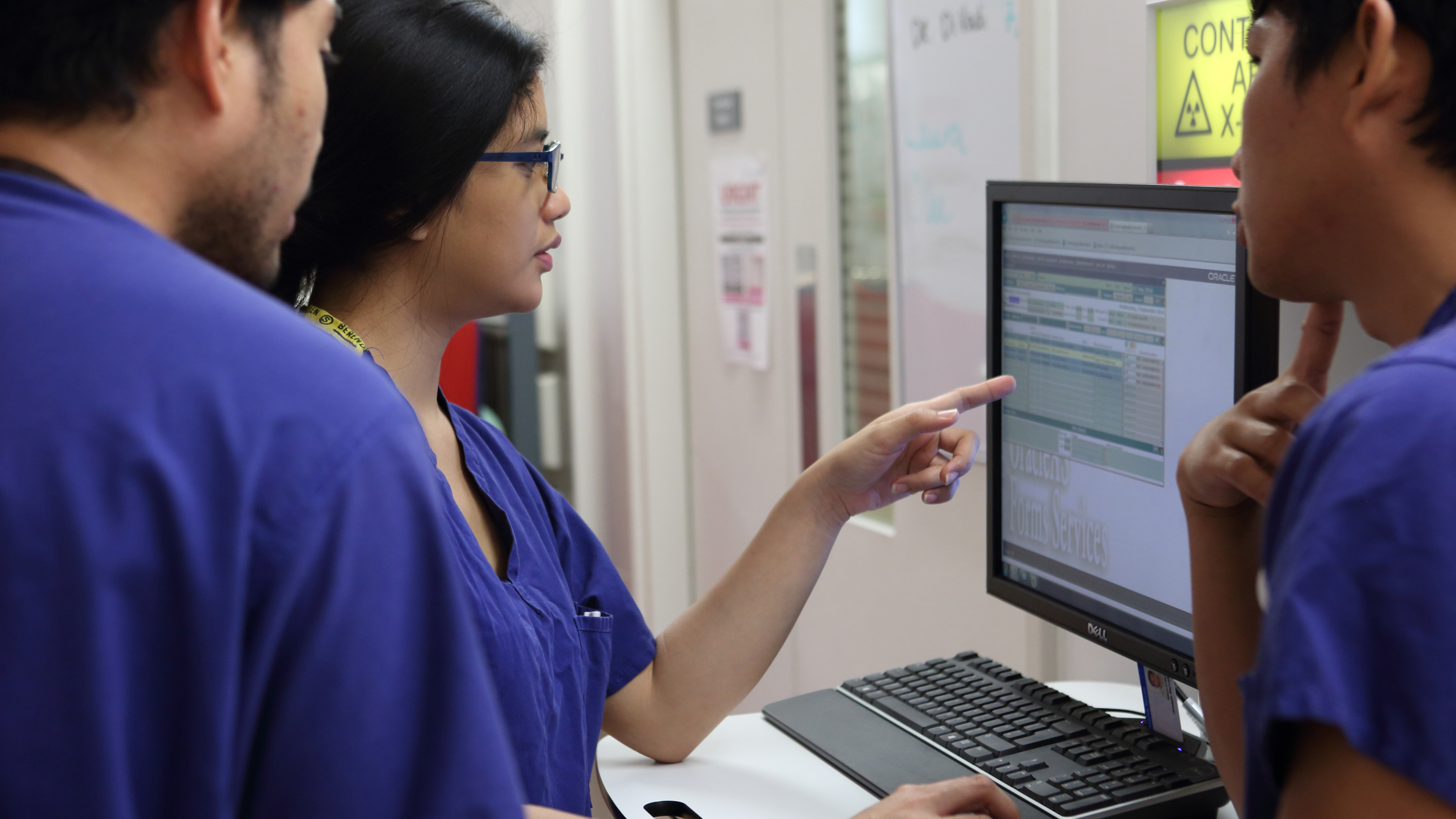 Resident Doctors Looking At Screen 20664 16X9